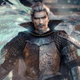 A grey-haired man in Samurai armor gazes as an avian spirit flies behind him.
